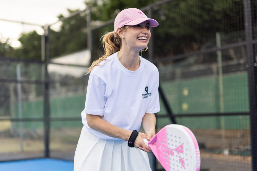 Actress Lily James playing padel
