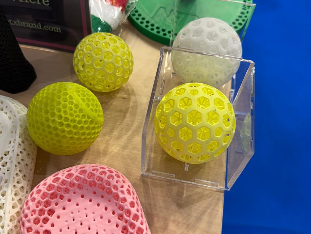 NETX 3D printed airless silent padel balls.